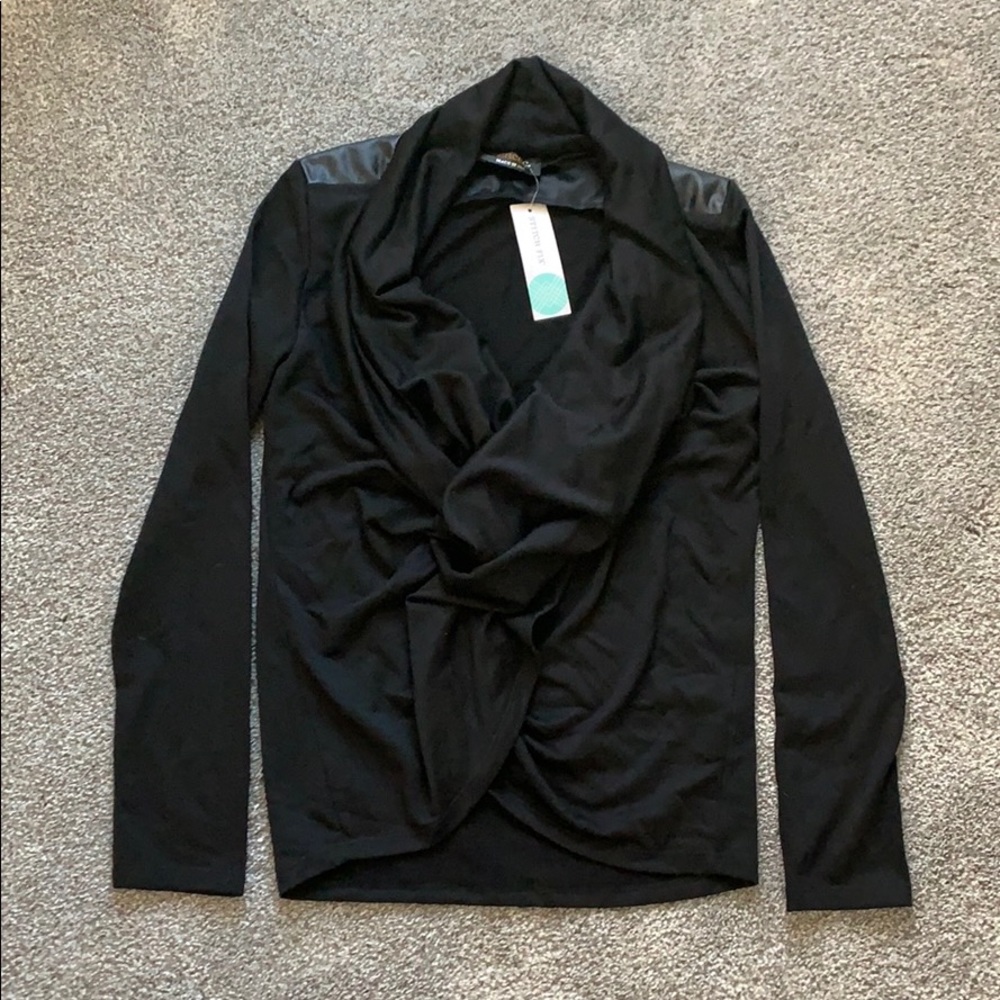 Black top with faux leather trim on back shoulders